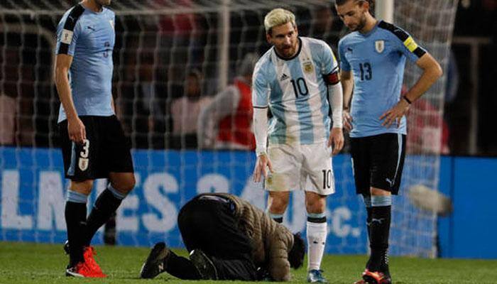 WATCH: Fan breaches security to kiss Lionel Messi&#039;s feet during Argentina vs Uruguay match