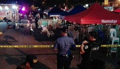 Blast at packed night market kills 12 as Philippine president visits hometown