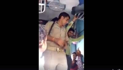 What a shame! Ghaziabad cop caught collecting 'haftaa' from train passengers -- Watch Viral Video