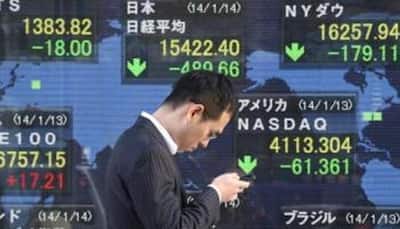 Asian shares climb on fading US rate expectations 