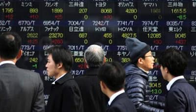 Asian stocks hit 1-year high as soft US data quells Fed hike talk