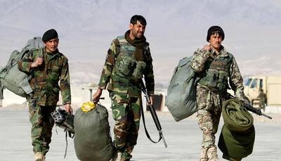 Afghan forces encircled by Taliban in provincial capital