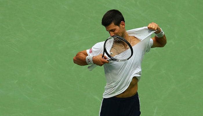 BIZARRE! Novak Djokovic ripped off his own shirt in the US Open semi-final – WATCH