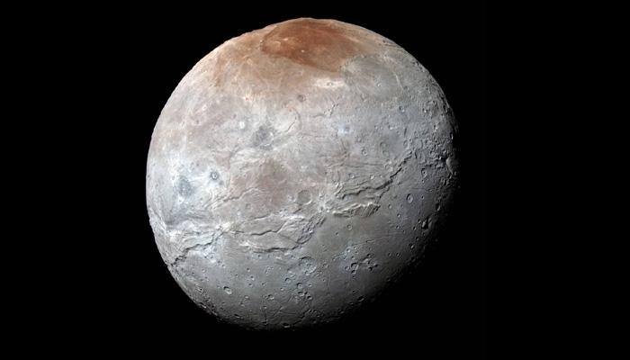 Mystery solved! Red patch on Pluto&#039;s largest moon Charon caused by trapped gas