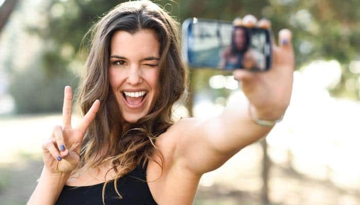 Sharing smiling selfies with friends can help you – Here’s how