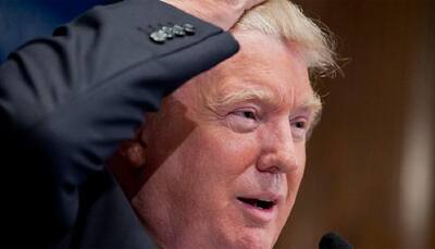 Trump's enigmatic hair put to the test on US TV