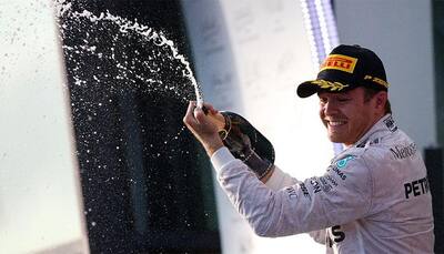 Singapore Grand Prix: Nico Rosberg takes title lead from Lewis Hamilton with 200th race win