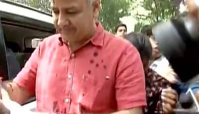 Ink attack on Delhi Deputy CM Manish Sisodia outside LG's house