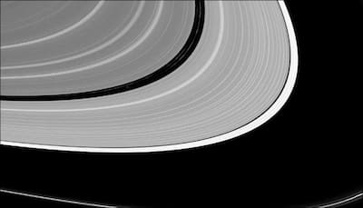 NASA's Cassini captures the reign of Pan, Saturn's small moon! - See pic