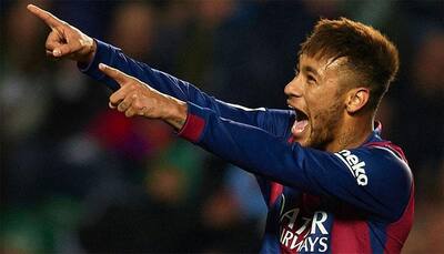 Suarez, Neymar fire Messi-less Barca top of La Liga