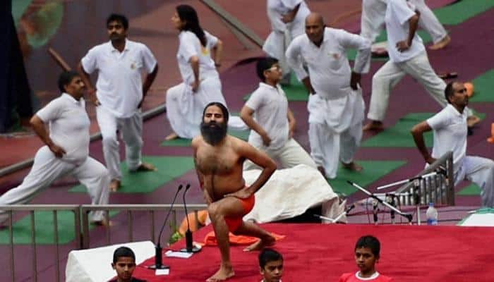 Delhi teachers get yoga training from Ramdev!