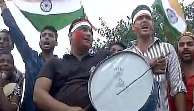 Uri attack martyrs ' kin, Indians hail PM Modi, cheer Army after surgical strikes across LoC