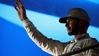Malaysian Grand Prix: Lewis Hamilton storms to pole at Sepang