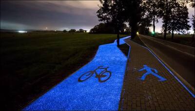 Poland's 'glow-in-the-dark' biking path has given moonlight cycling a new definition! - Watch video