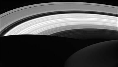 NASA's Cassini captures Saturn's rings in the daylight on the planet's nightside! - See pic