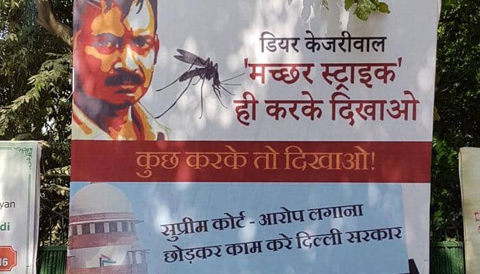 &#039;Dear Kejriwal, first kill a mosquito then seek proof of surgical strikes&#039;, says poster outside BJP HQ