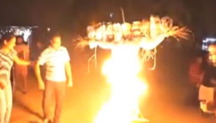 NSUI students burn PM Narendra Modi in effigy at JNU: `Home Ministry seeks Delhi Police's report`