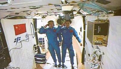 Chinese astronauts set foot in space station as Shenzhou-11 docks with Tiangong-2 orbital lab