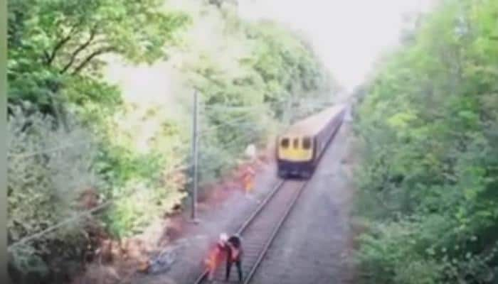 Narrow escape! Rail worker saves drunk man from oncoming speeding train