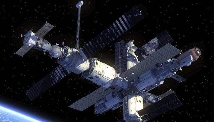 Russian spacecraft Soyuz carrying three crew members docks with ISS