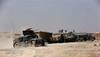 Iraqi forces advance near Mosul as IS attacks western town