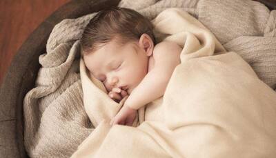 Sleeping beside your baby can cause cot death