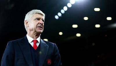 Arsenal's Arsene Wenger downplays hooliganism problem in English game