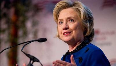 Clinton faces FBI probe as race enters final 10 days