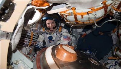 NASA astronaut Kate Rubins finishes final spacesuit checks before her team's descent to Earth! - See pic