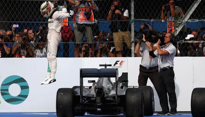 Mexican GP: Lewis Hamilton pips teammate Nico Rosberg to keep title charge alive 
