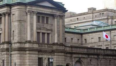 BOJ keeps policy steady, delays inflation target again