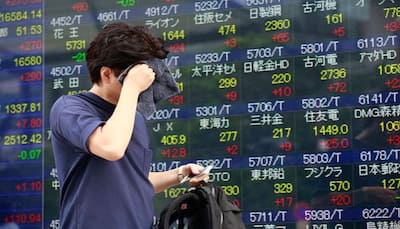 World stocks choke on US election fears, pound powers on