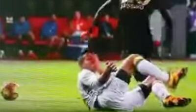Robin van Persie eye injury: Former Manchester United star rushed to hospital after colliding with opponent
