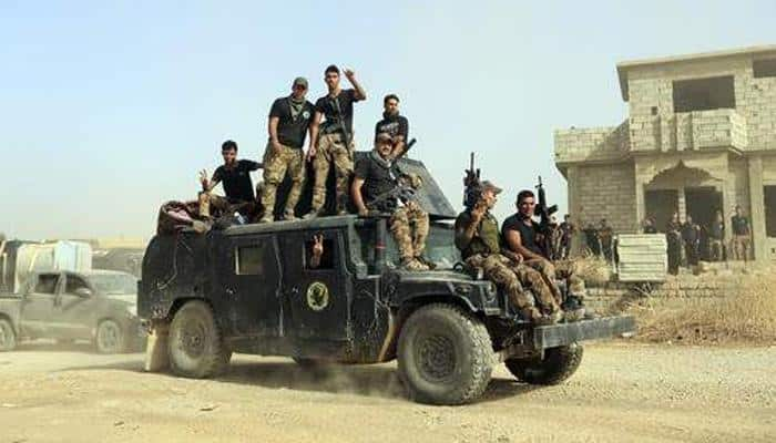 Iraq forces retake key town from Islamic State group