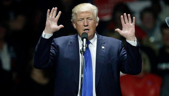 Will suspend Syrian refugee program if elected, says Donald Trump