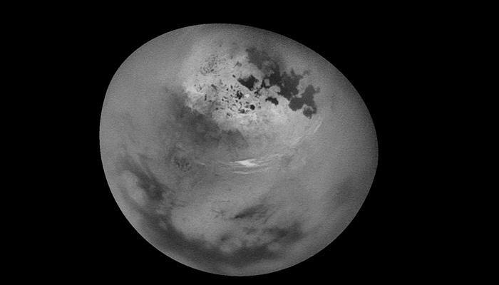 NASA&#039;s Cassini captures methane clouds drifting across Saturn&#039;s largest moon Titan – Watch!