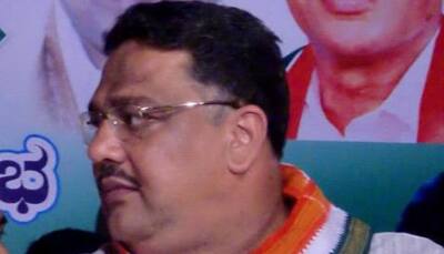 Karnataka minister 'caught' watching obscene pictures on mobile at an official function
