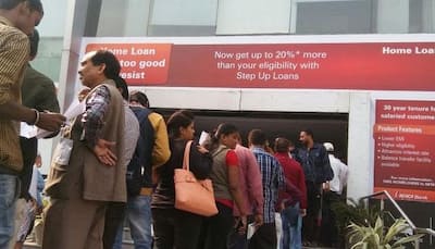 Long queues, chaos continue at ATMs even as banks pump in cash