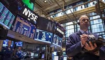 Dow hits new record but Trump effect eases on Wall Street