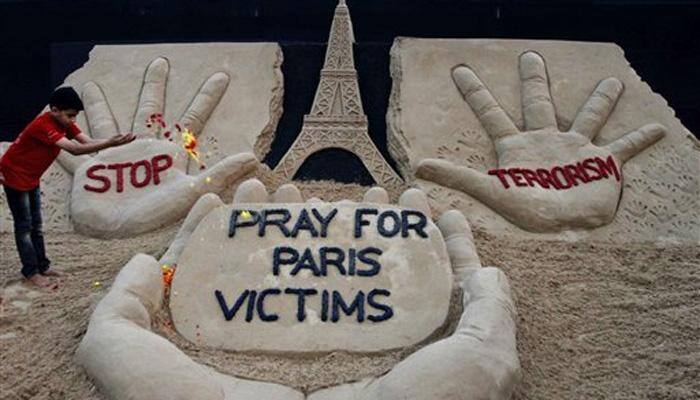 Sorrowful France marks first anniversary of Paris massacre