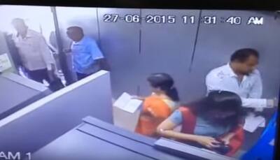 Beware! Thieves lurking at ATMs, video of this girl stealing money goes viral - WATCH