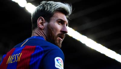 Vomiting Lionel Messi misses Barcelona's Malaga clash