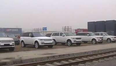 Watch video: China-Europe cargo train arrives with 80 Bentleys and Land Rovers!