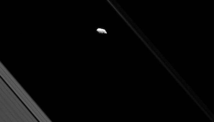 NASA&#039;s Cassini spacecraft captures breathtaking view of Saturn&#039;s F ring and its moon &#039;Prometheus&#039;