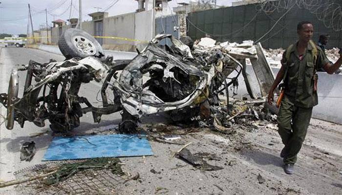 Suicide car blast kills 16 at Police station in Somalia's capital of Mogadishu