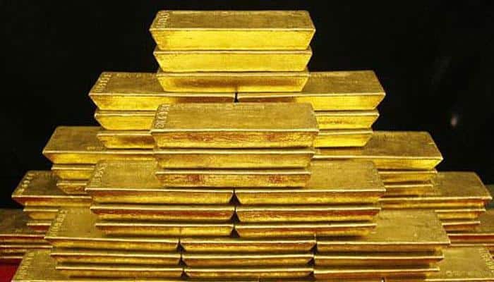Gold calm  ahead of Fed meet outcome, silver weakens on muted demand