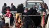 Gunmen burn buses, hindering Aleppo evacuation deal