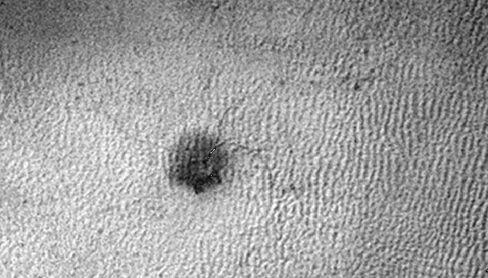 NASA orbiter detects small troughs growing on Mars which may become 'spiders'