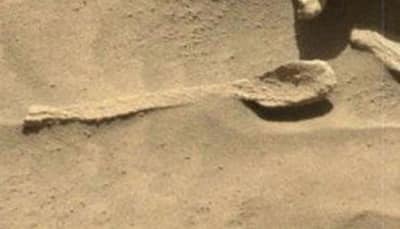 Real or illusion? UFO hunters find 'spoon' on Mars again in NASA photo - Watch video
