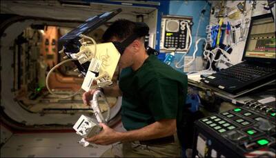NASA astronaut Shane Kimbrough does a 'George Clooney'; ESA's Thomas Pesquet captures moment!